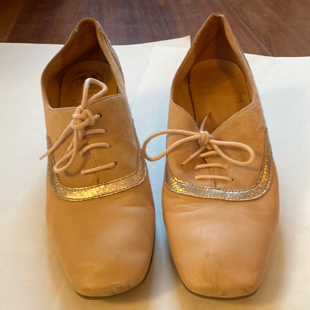 a pinkish nude color heel